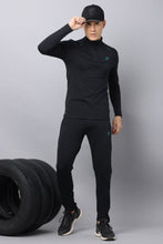 UNISEX BLACK ZIPPER LONG SLEEVE TOP | GREEN LOGO wait